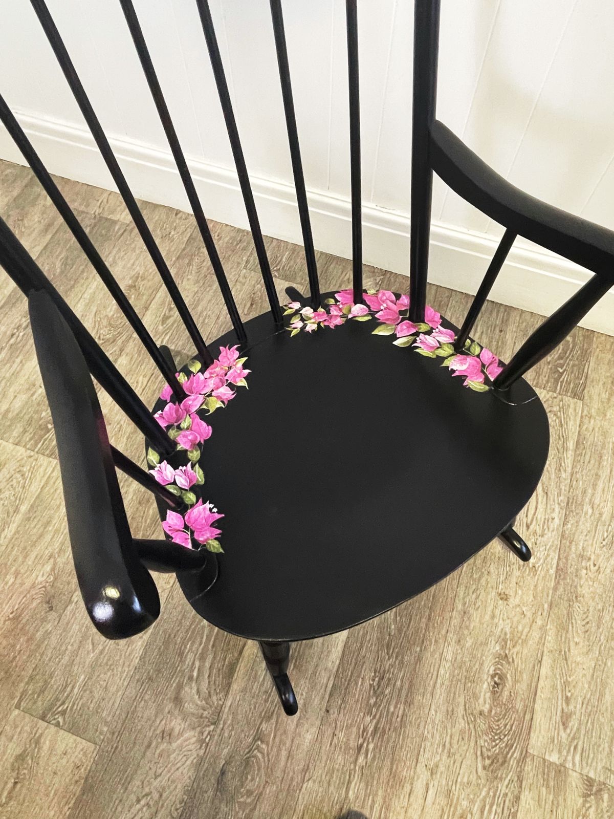 Black Wheel Back Rocking Chair With Pink Flower Design photo for sale