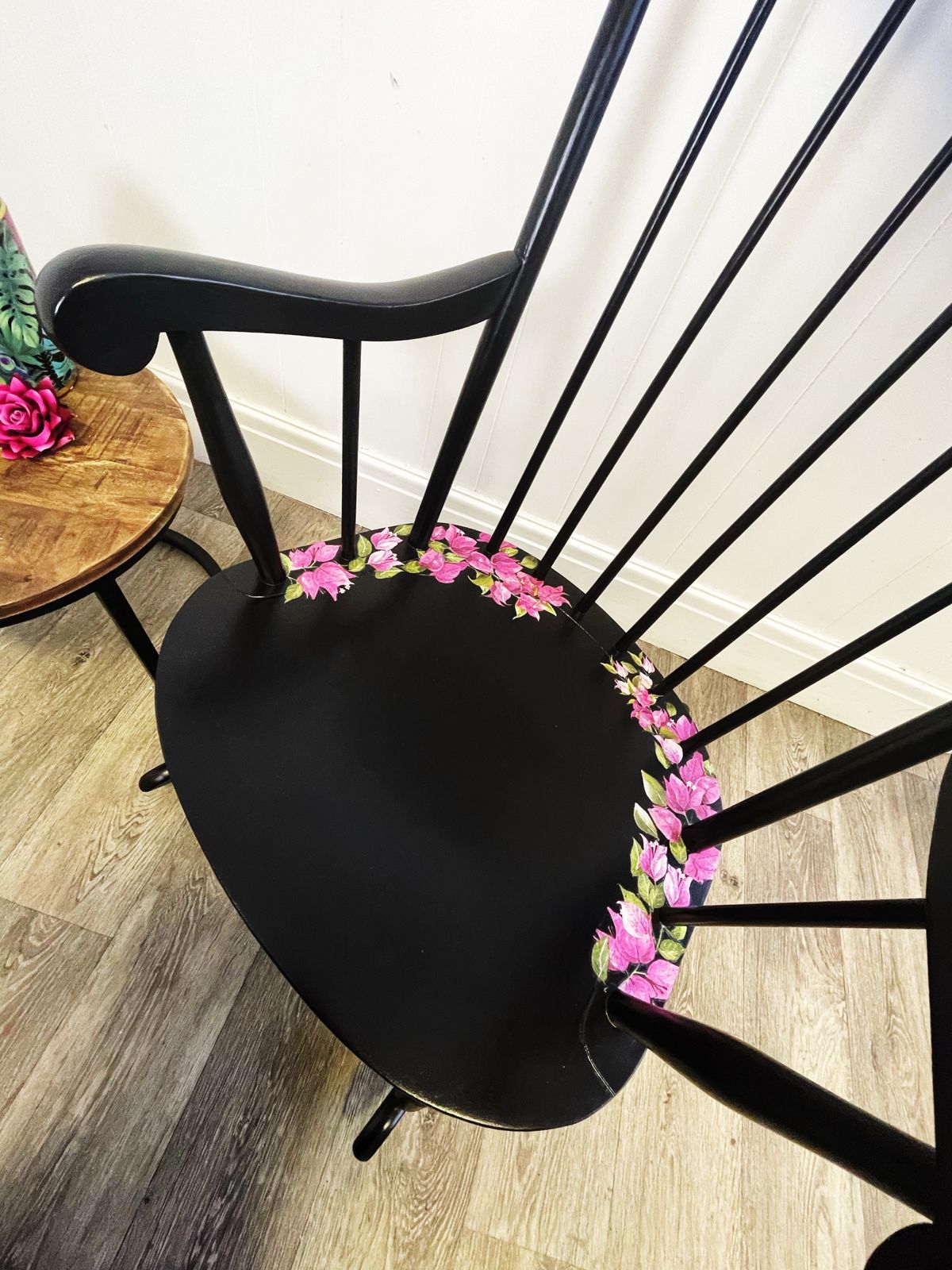 Black Wheel Back Rocking Chair With Pink Flower Design photo vinterior