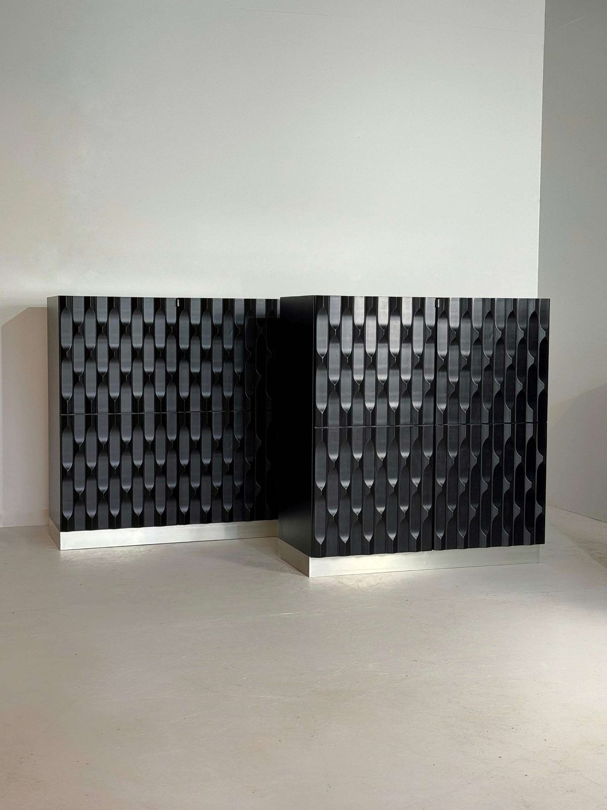 Pair Of Black Brutalist Cabinets With Graphic Door Panels, 1970s photo for sale
