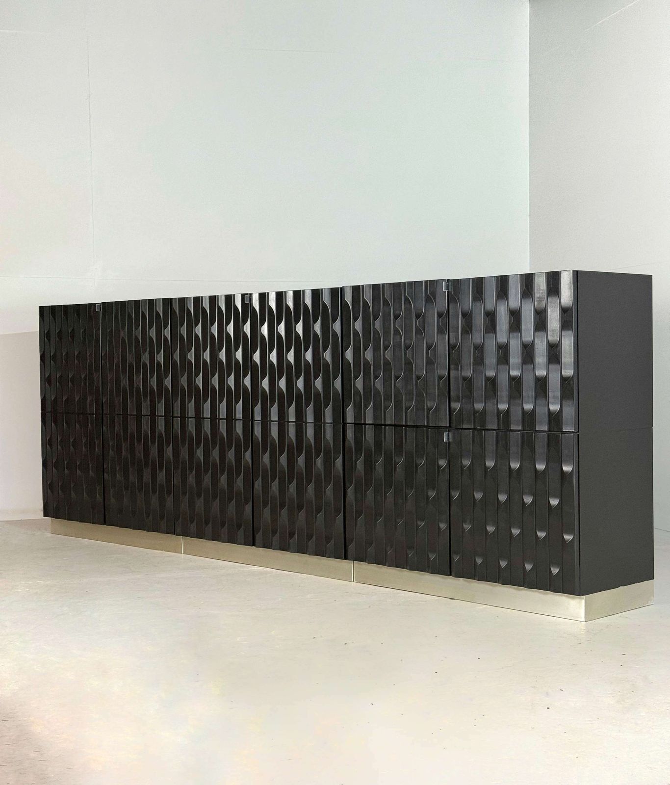 photo buy Pair Of Black Brutalist Cabinets With Graphic Door Panels, 1970s