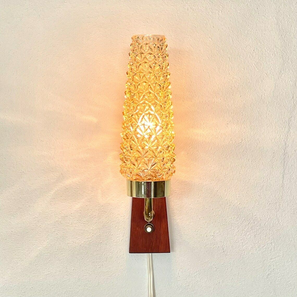 Single Danish Mid Century Teak Wooden Wall Lamp With Heavy Amber Glass Shade In Spike Pattern photo furniture