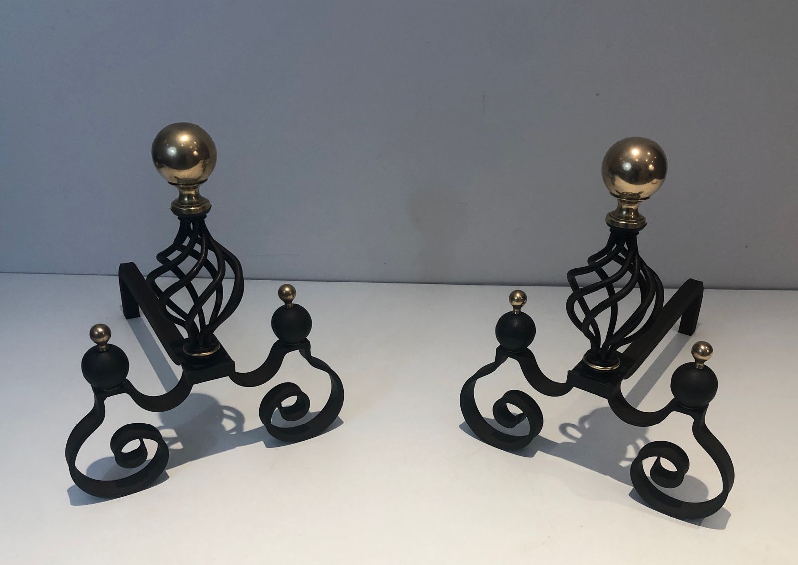 Pair Of Wrought Iron Andirons Topped With A Brass Ball photo Home Fixtures