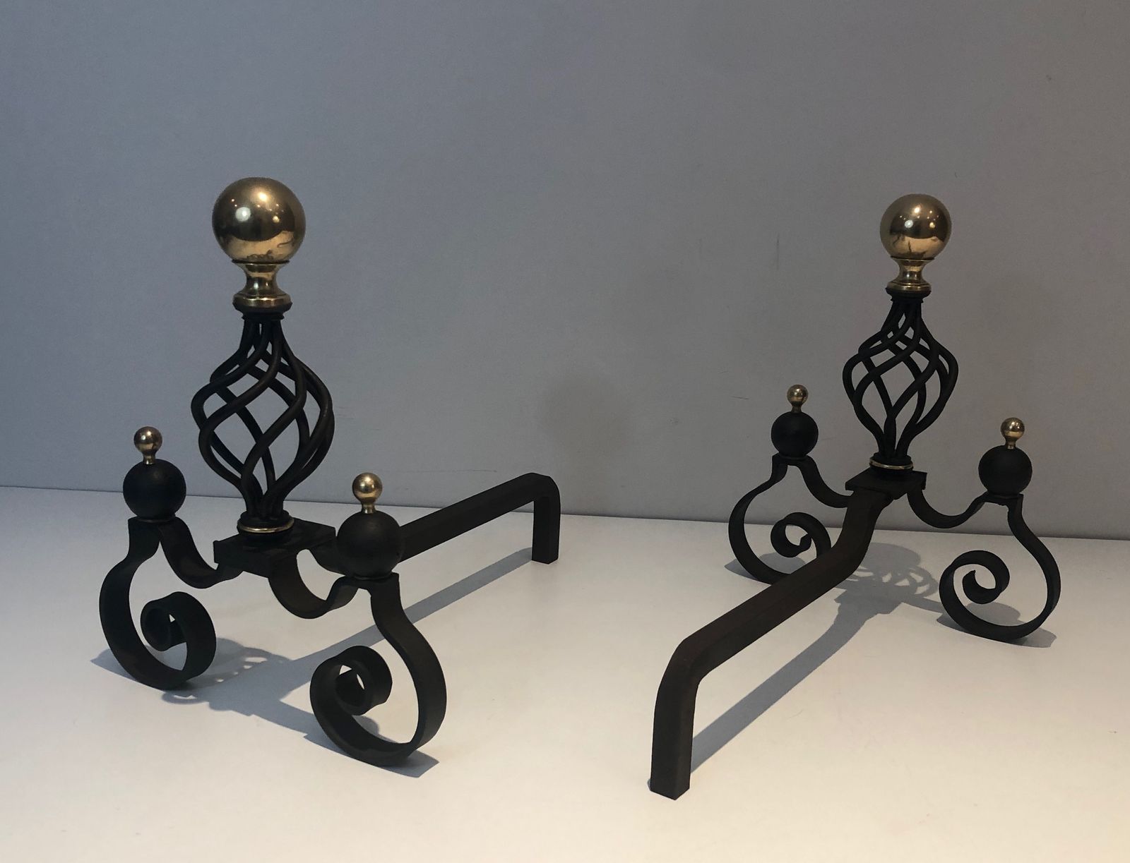 Pair Of Wrought Iron Andirons Topped With A Brass Ball photo vinterior