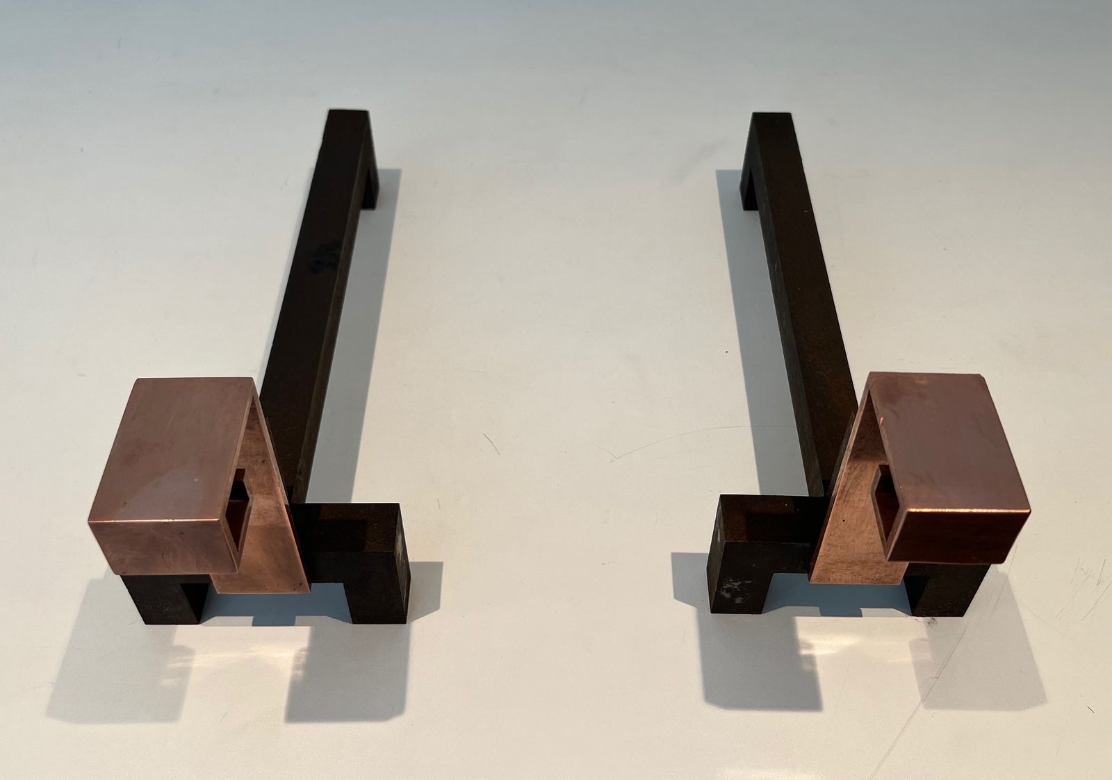 Pair Of Modernist Chenets In Copper And Forged Iron photo for sale