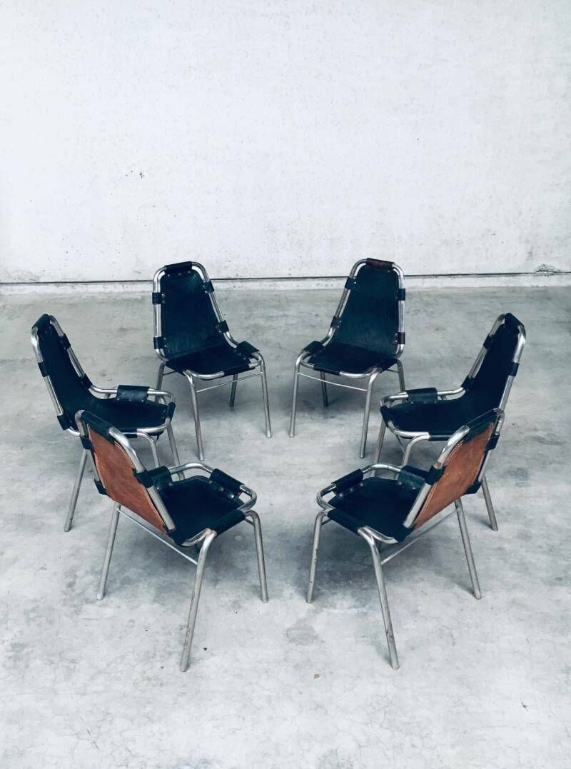photo vinterior Industrieel Design Eetkamerstoelen Van Leer En Staal, Model "Les Arcs", Jaren 1980