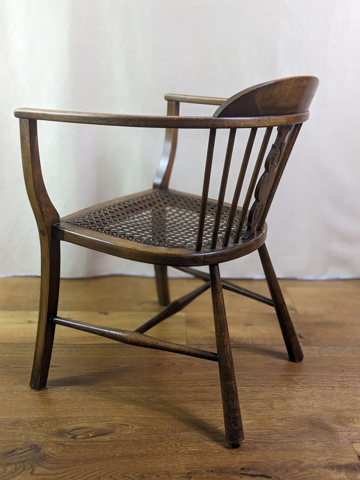 Very Pretty Victorian Rattan Cane Bergere Tub Chair From Late 19th Century With Half Spindle Back And Pierced Central Splat photo vinterior