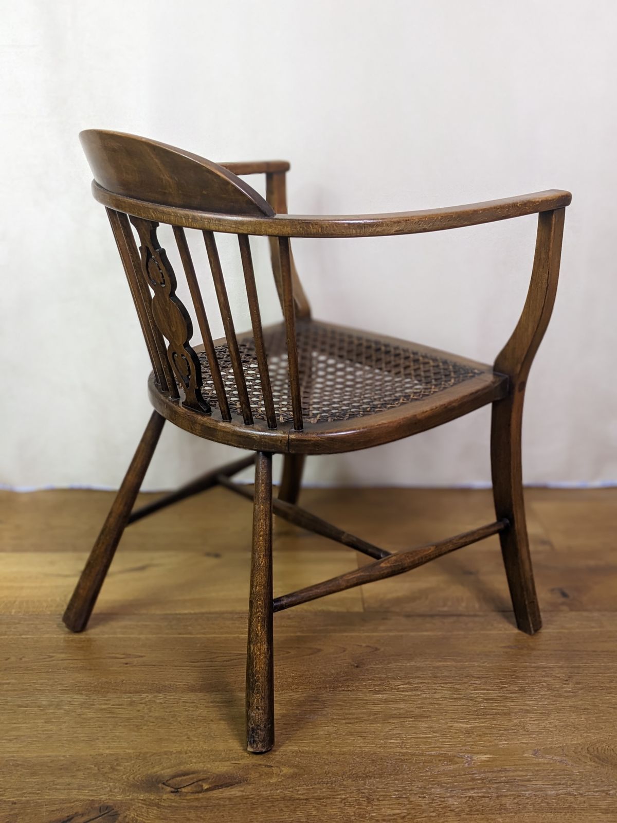 Very Pretty Victorian Rattan Cane Bergere Tub Chair From Late 19th Century With Half Spindle Back And Pierced Central Splat photo buy