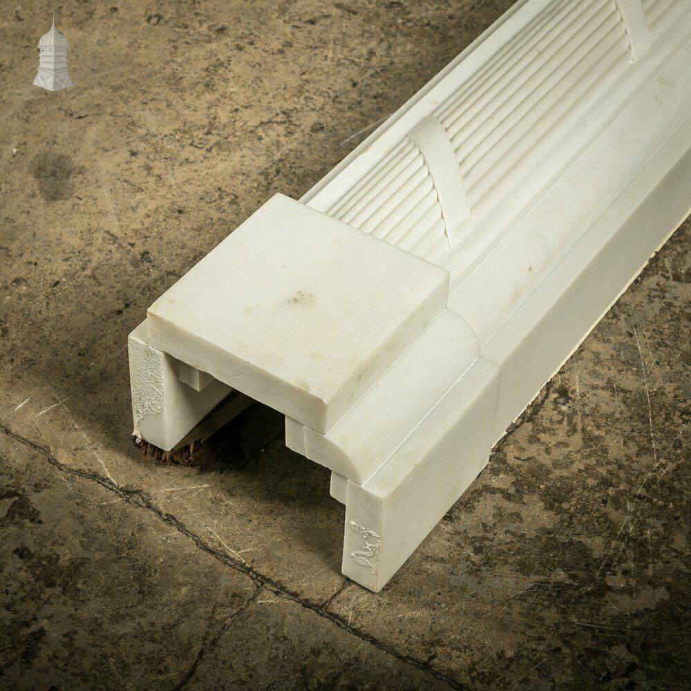 White Marble Fireplace Of Roman Ornate Design photo vintage
