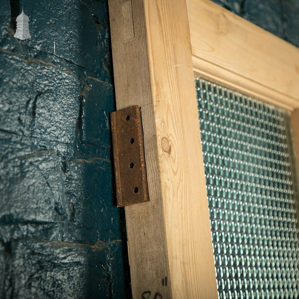 312.0 Glazed Pine Door, 4 Panels, 2 With Textured Glazing photo