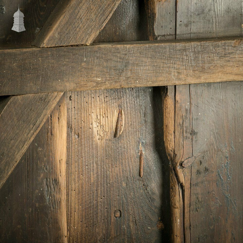 Home Fixtures Rustic Pine Ledged And Braced Door With Large Iron Strap Hinges photo