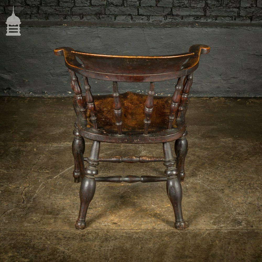 photo furniture 19th C Captains Bow Seat Smokers Chair With Turned Arm Supports And Double H Stretcher