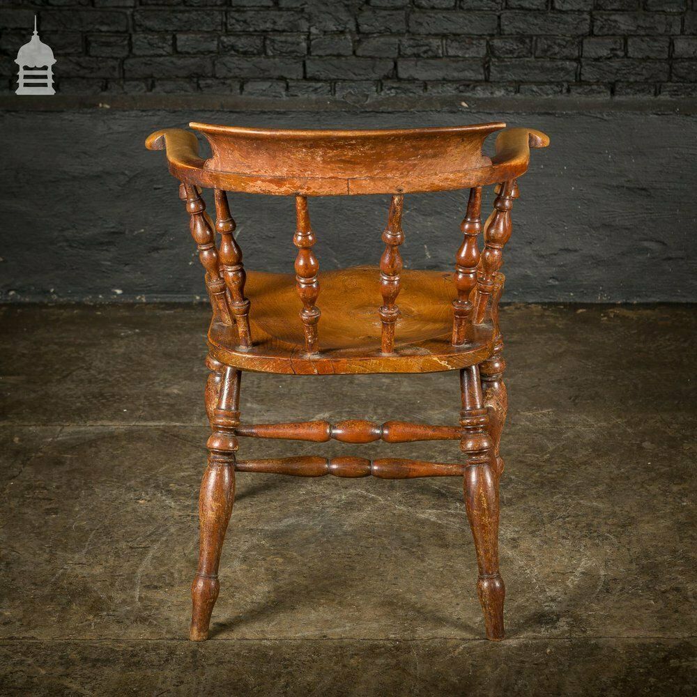 photo vinterior 19th C Elm Captains Bow Seat Smokers Chair With Turned Arm Support And Double H Stretcher