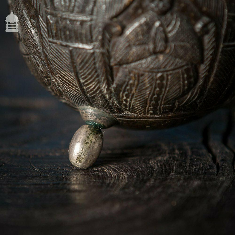 photo furniture Pair Of Antique South East Asian Carved Coconut Cups On Silver Feet
