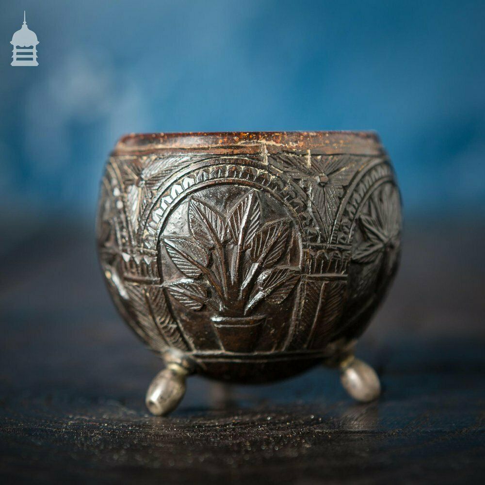 870.0 Pair Of Antique South East Asian Carved Coconut Cups On Silver Feet photo