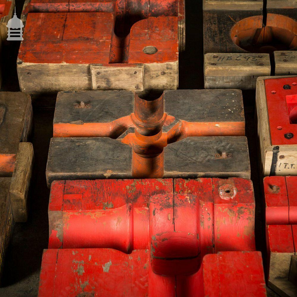 photo for sale Collection Of 18 Red And Black Industrial Factory Moulds