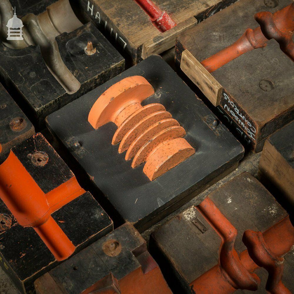 2700.0 Collection Of 60 Black And Red Industrial Factory Foundry Moulds photo
