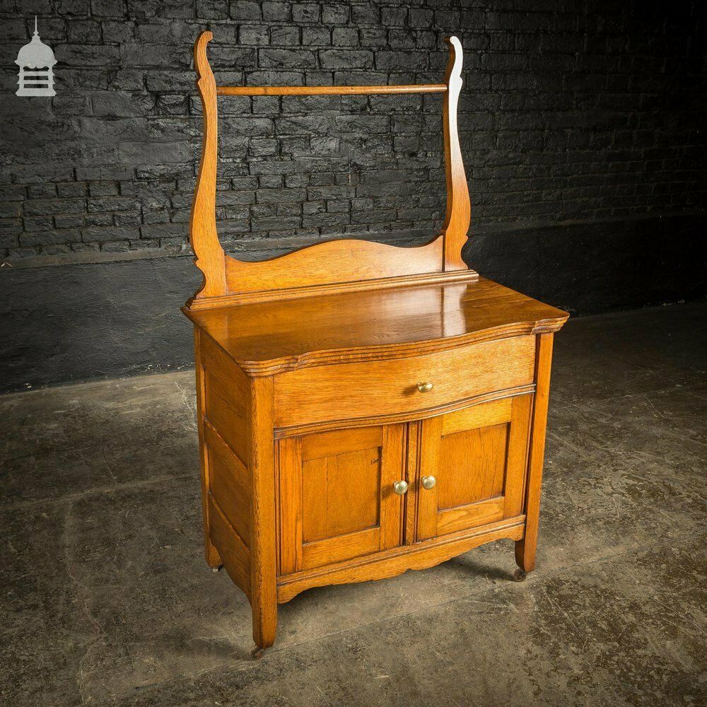 834.0 19th C Oak Vanity Unit On Castors With Bouffant Drawer photo