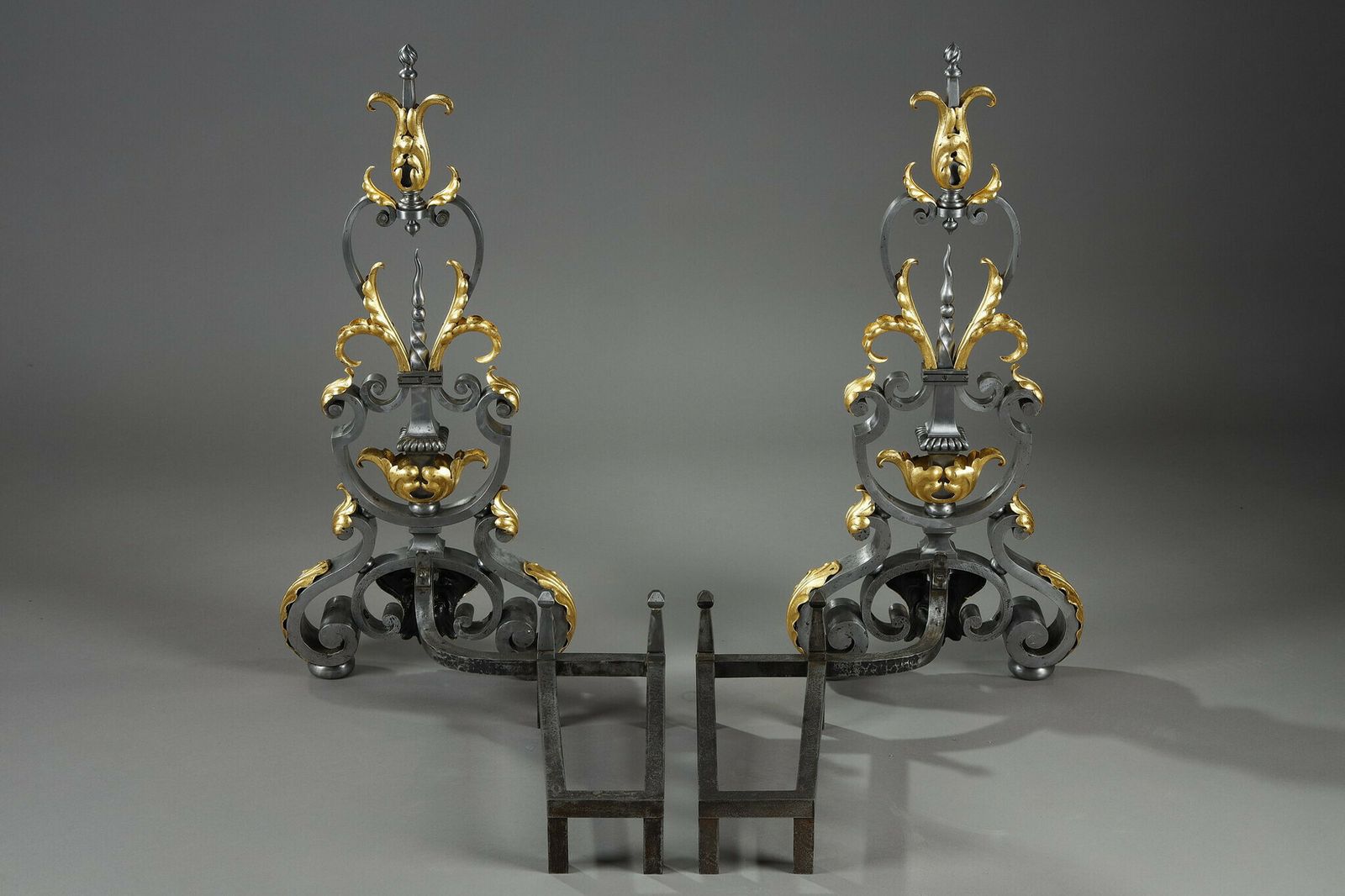 Pair Of Wrought Iron Landiers With Foliage, Mask And Scroll Decoration photo vinterior