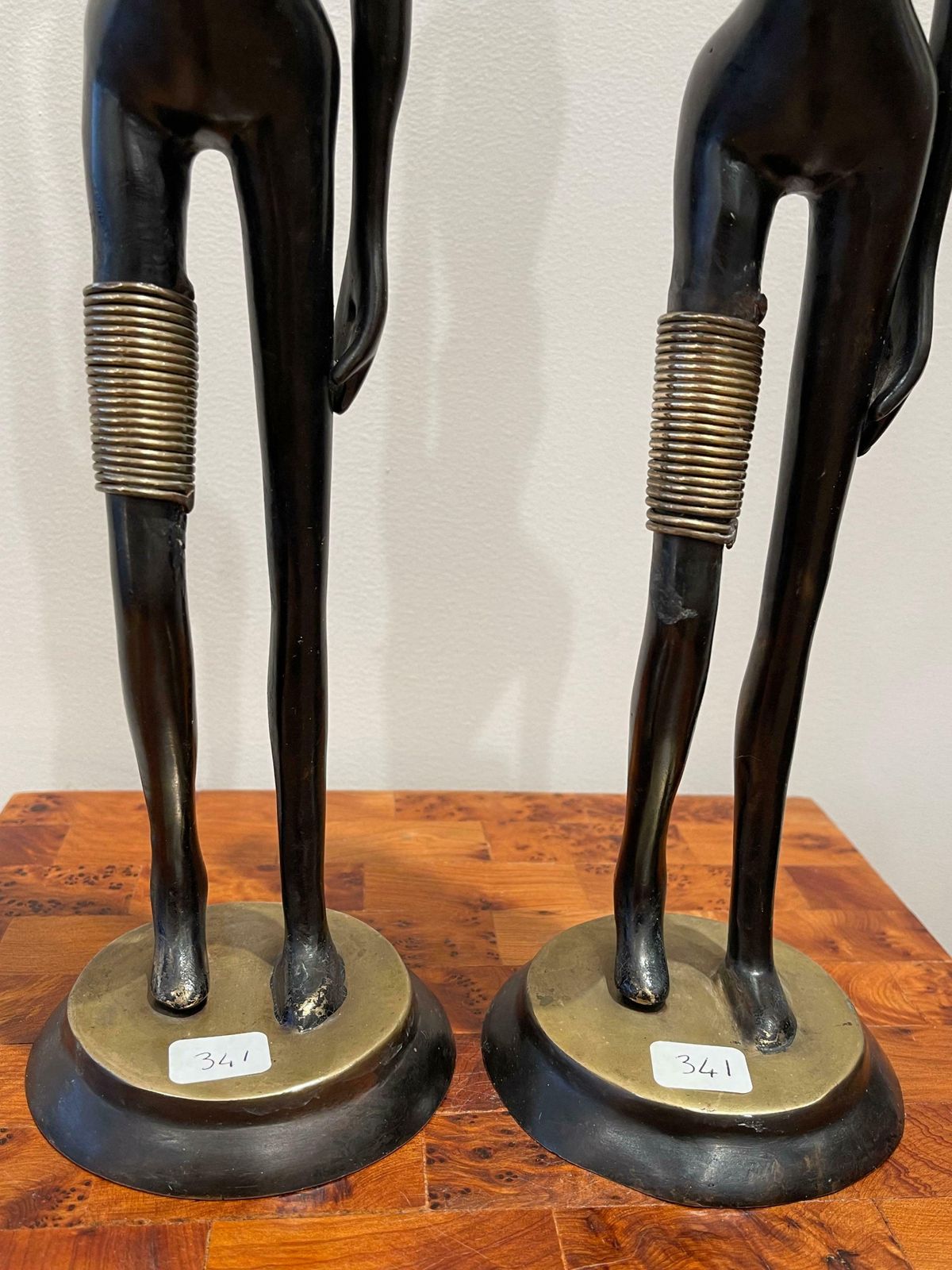 photo furniture A Pair Of Women Carrying Water, In The Style Of Hagenauer