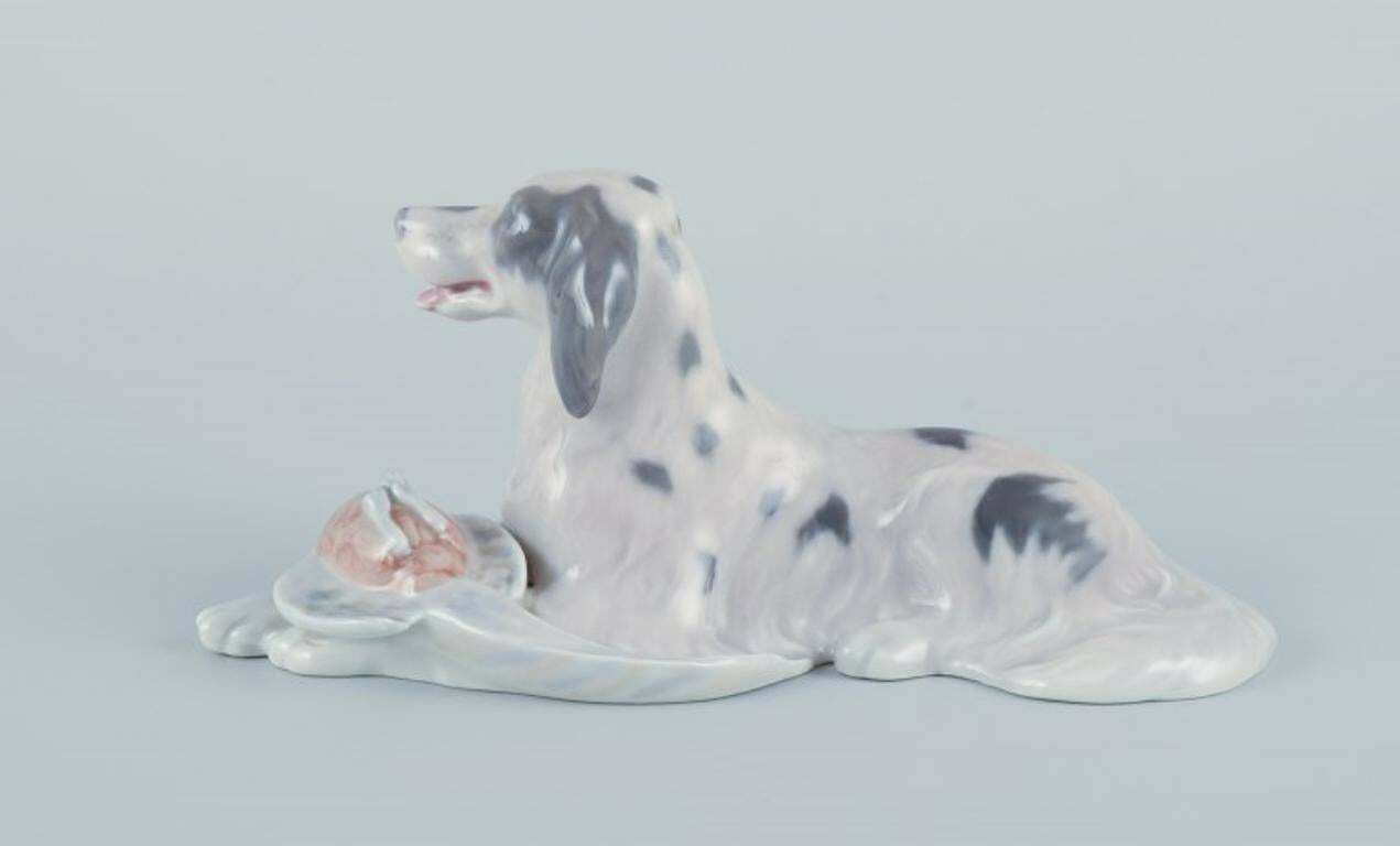 Royal Copenhagen, Porcelain Figurine Of A Setter With Pheasant. photo furniture