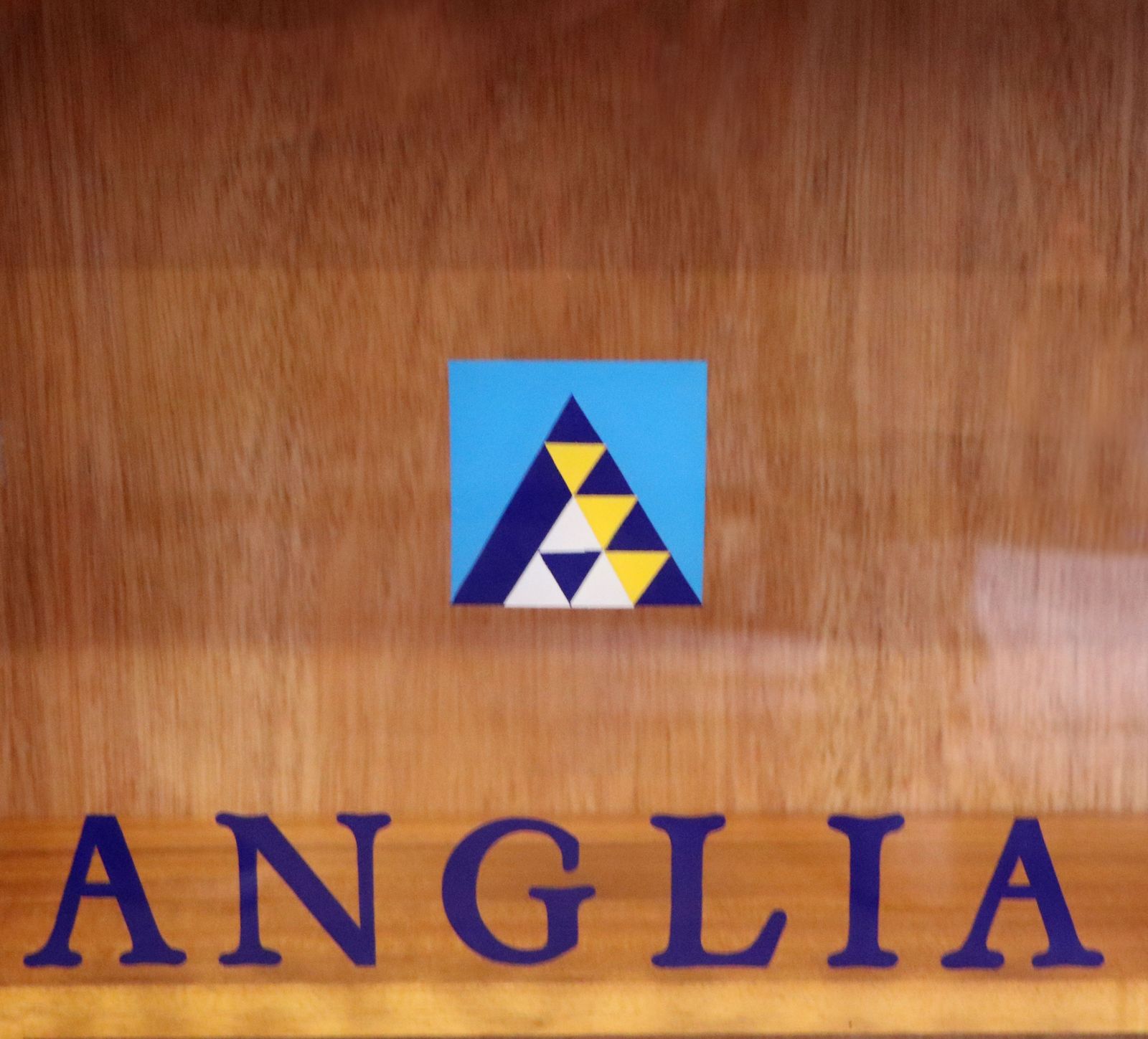 A Mid Century Gibbs Display Cabinet With The Anglia Television Logo. photo vinterior