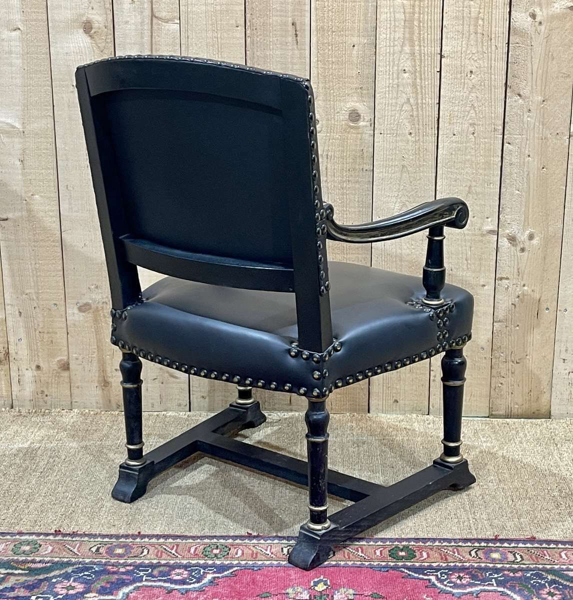 photo for sale English Armchair From The 1950s In Blackened Wood
