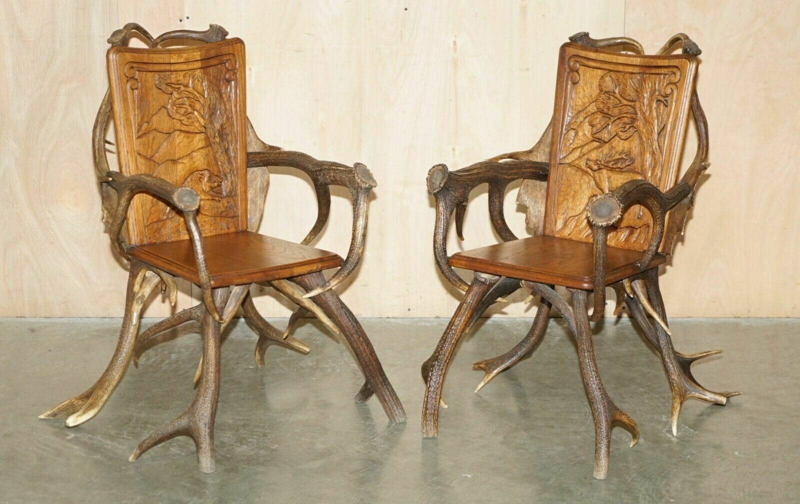 Pair Of Antique German Black Forest Carved Antler Armchairs Part Of A Suite