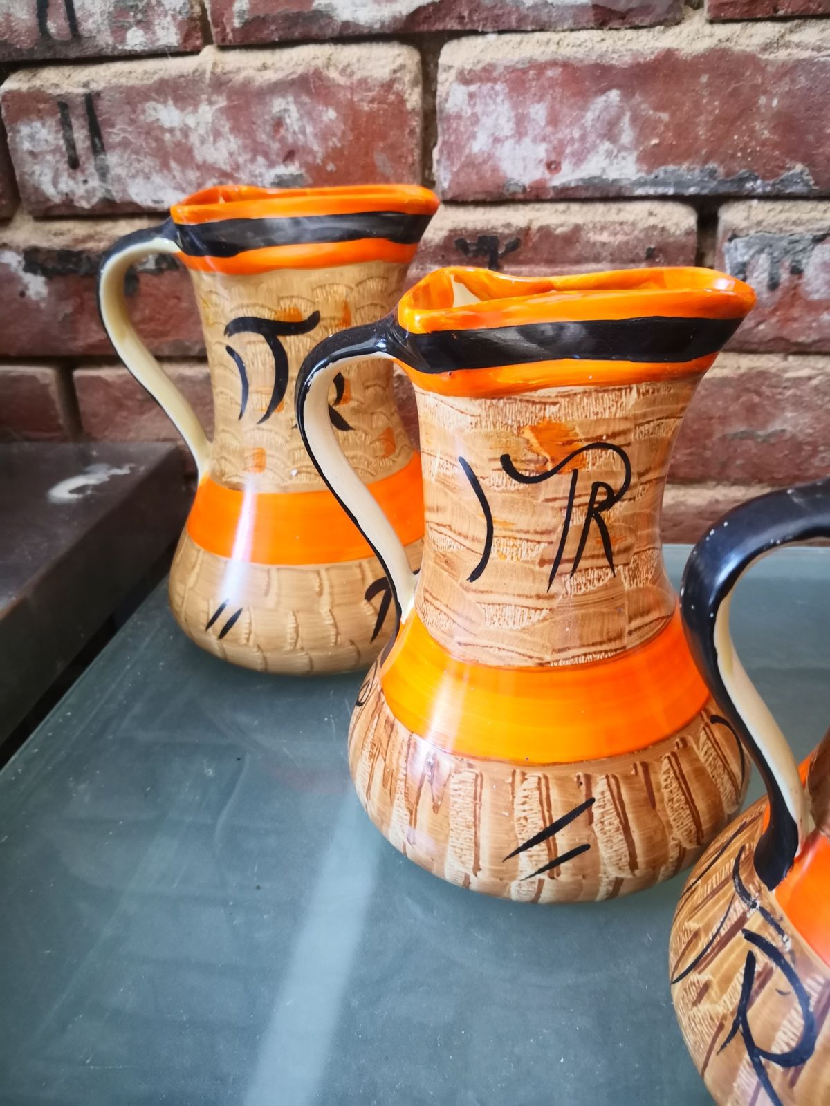 Trio Of Art Deco Graduating Myott Hand Painted Orange, Brown And Black Jugs photo furniture