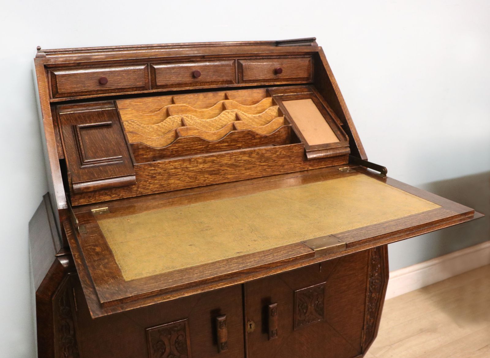 Furniture A Most Unusually Configured Oak Veneered Bureau. photo