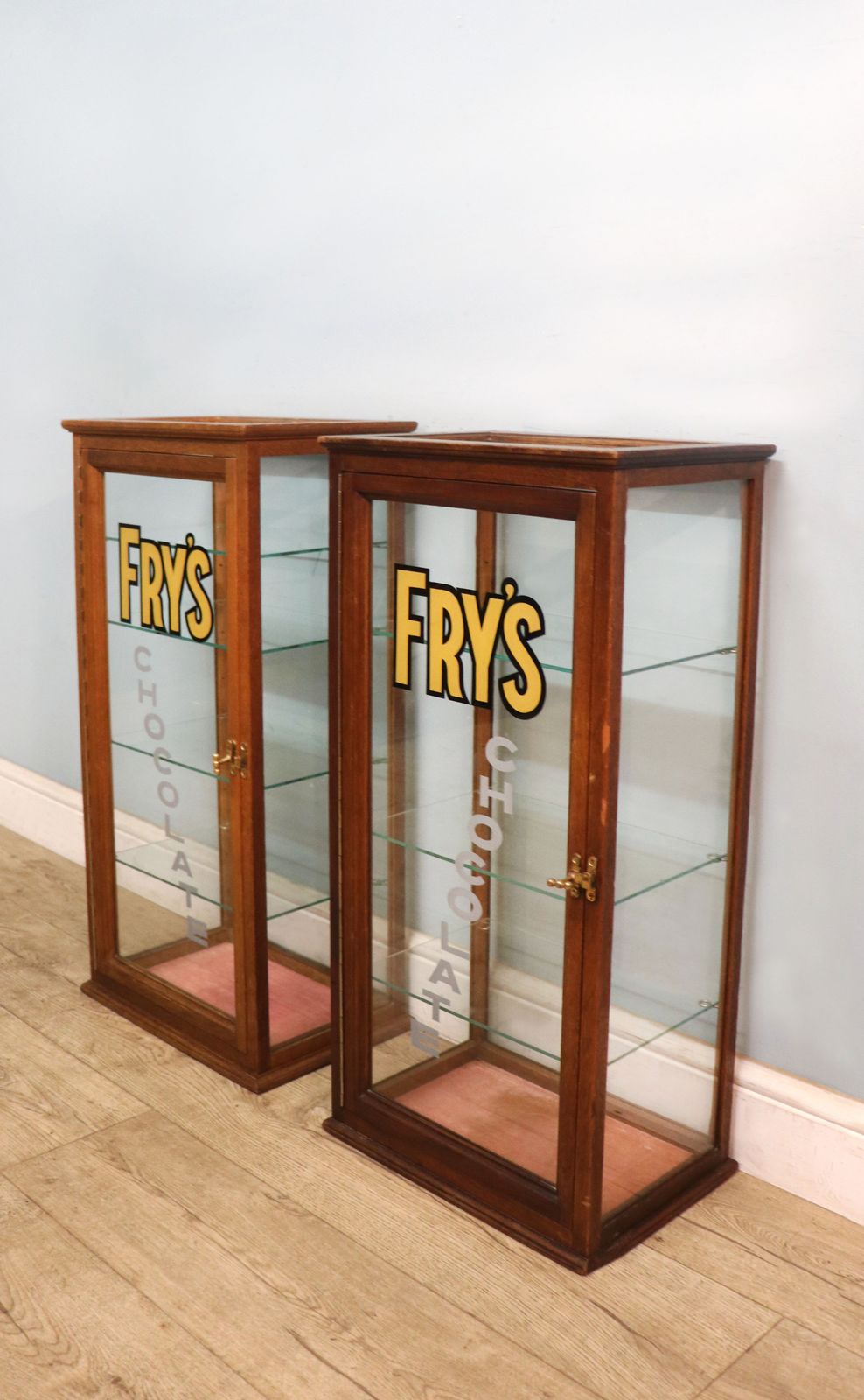 A Lovely Pair Of Early 20th Century Counter Display Cabinets Later Sign Written For Frys Chocolate. photo for sale