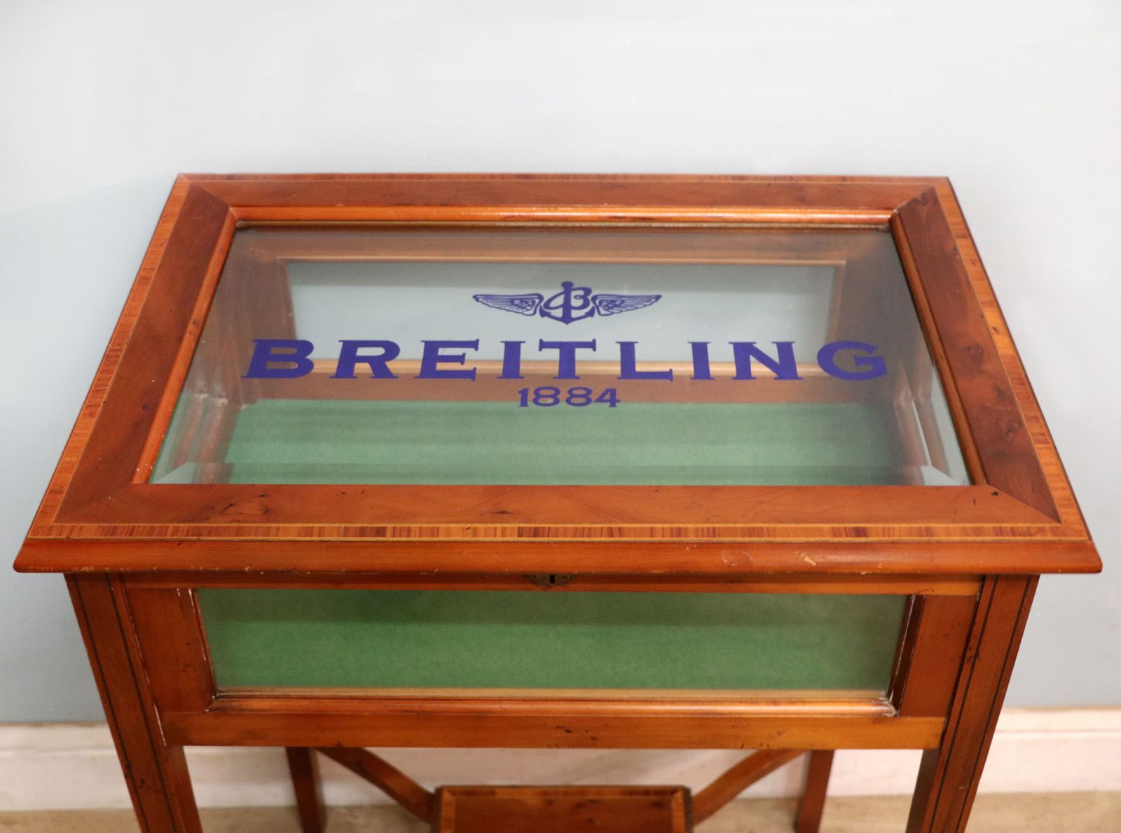 Furniture A Lovely Yew Wood Veneered Bijouterie Display Table, Later Sign Written For Breitling Watches. photo