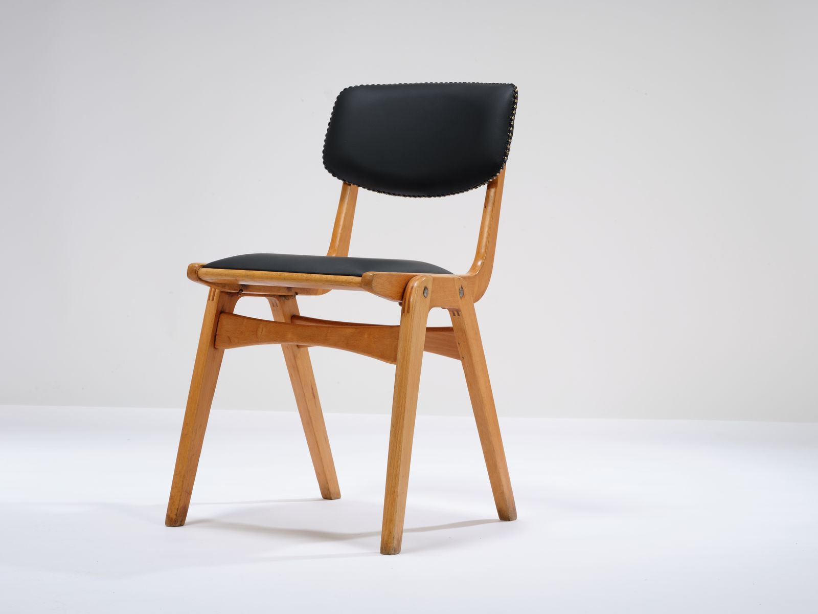 Vintage Stackable Beech 'Ben Cafe Chair' Reupholstered In Soft Expresso Leather With Stud Detailing, Circa 1960's, 8 Available. photo furniture