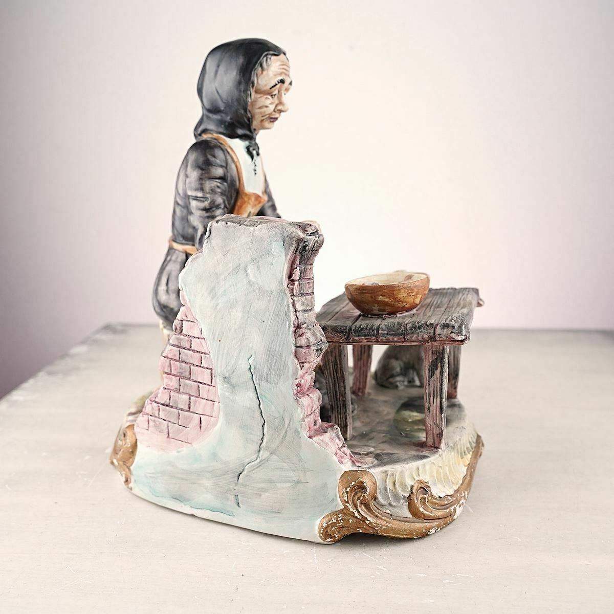 Bassano Porcelain Statue Of Elderly Figure With Cat photo for sale