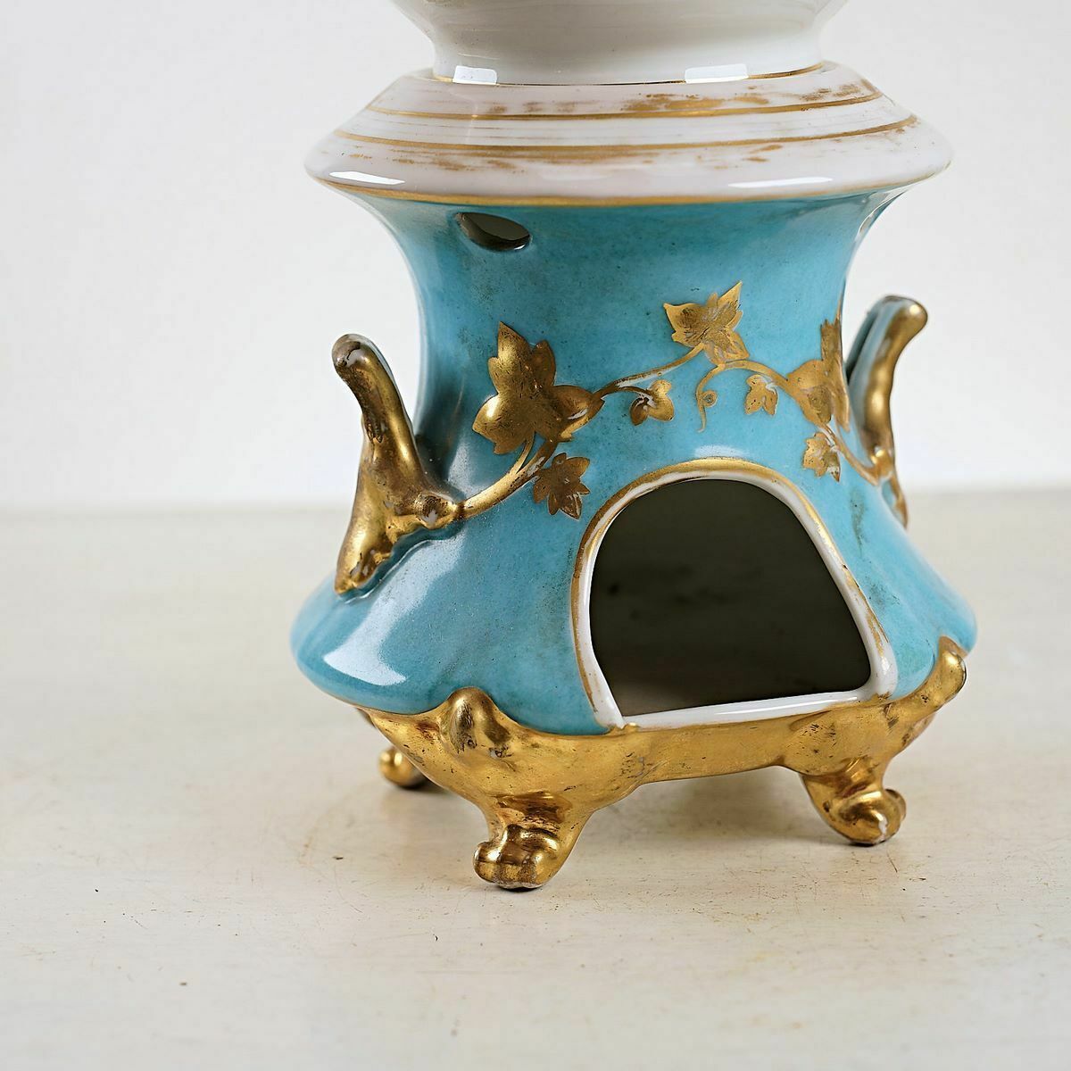Antique Porcelain Teapot With Floral Decorations And Golden Details photo furniture