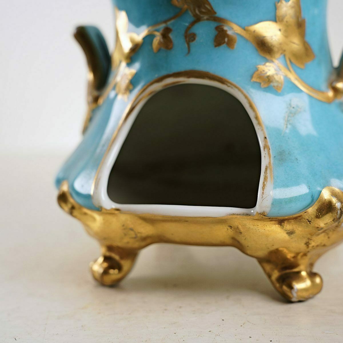 Antique Porcelain Teapot With Floral Decorations And Golden Details photo buy