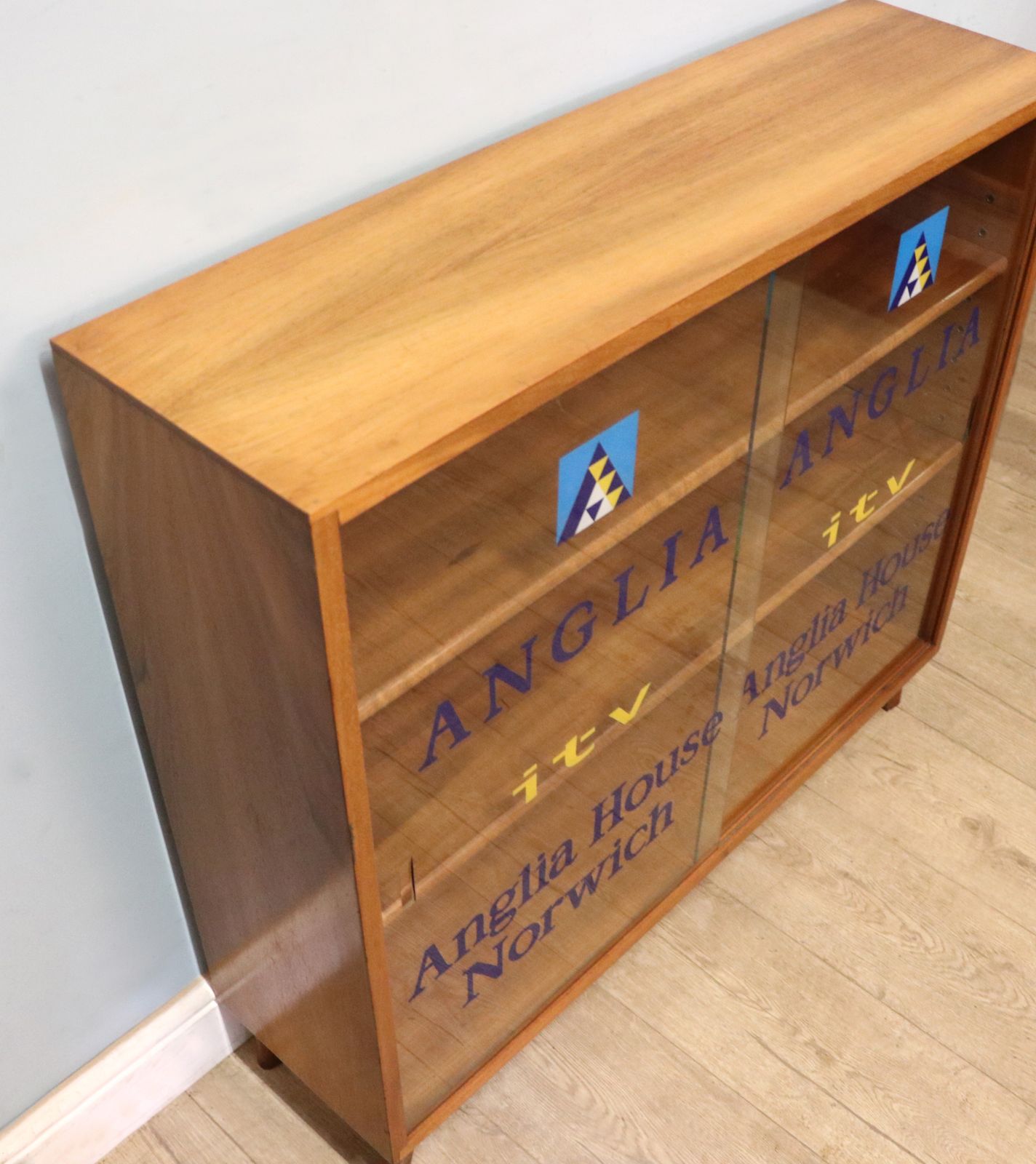 A Lovely Quality Mid Century Bookcase Cabinet,  Later Sign Written For Anglia Television. photo Furniture