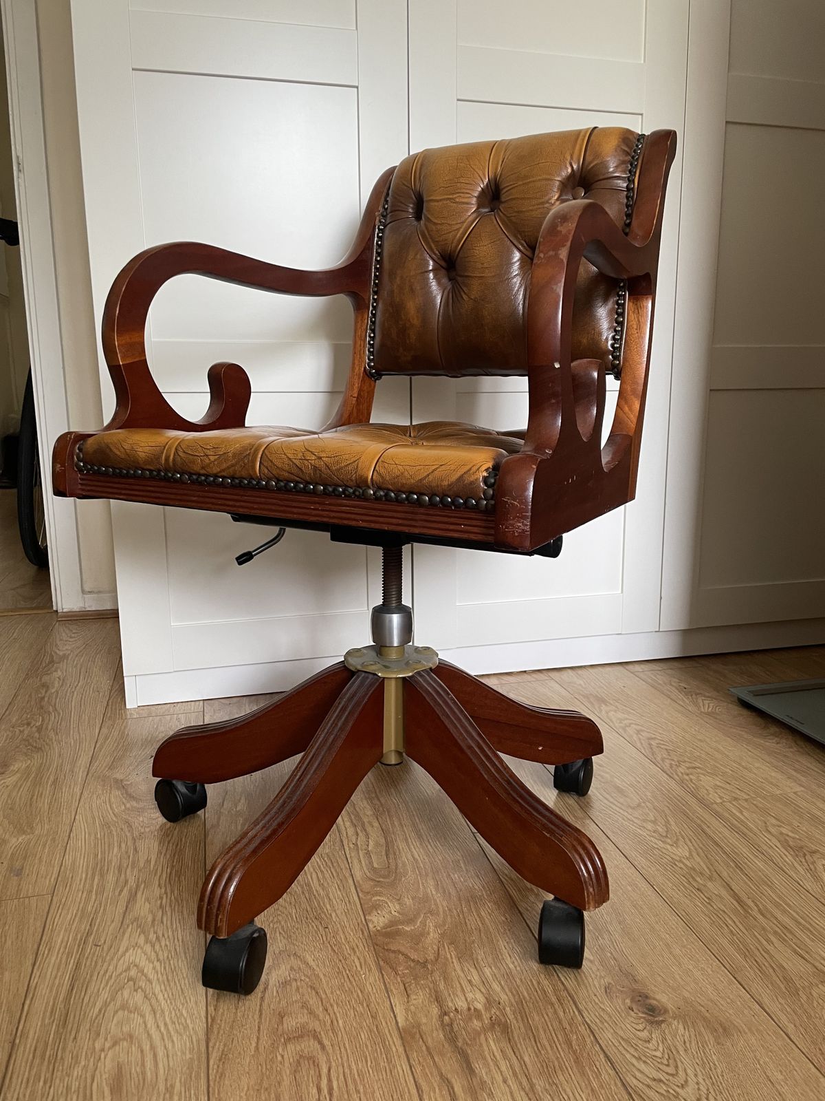 Captain's Wooden Swivel Chair, Embroidered With Leather Upholstery. photo for sale
