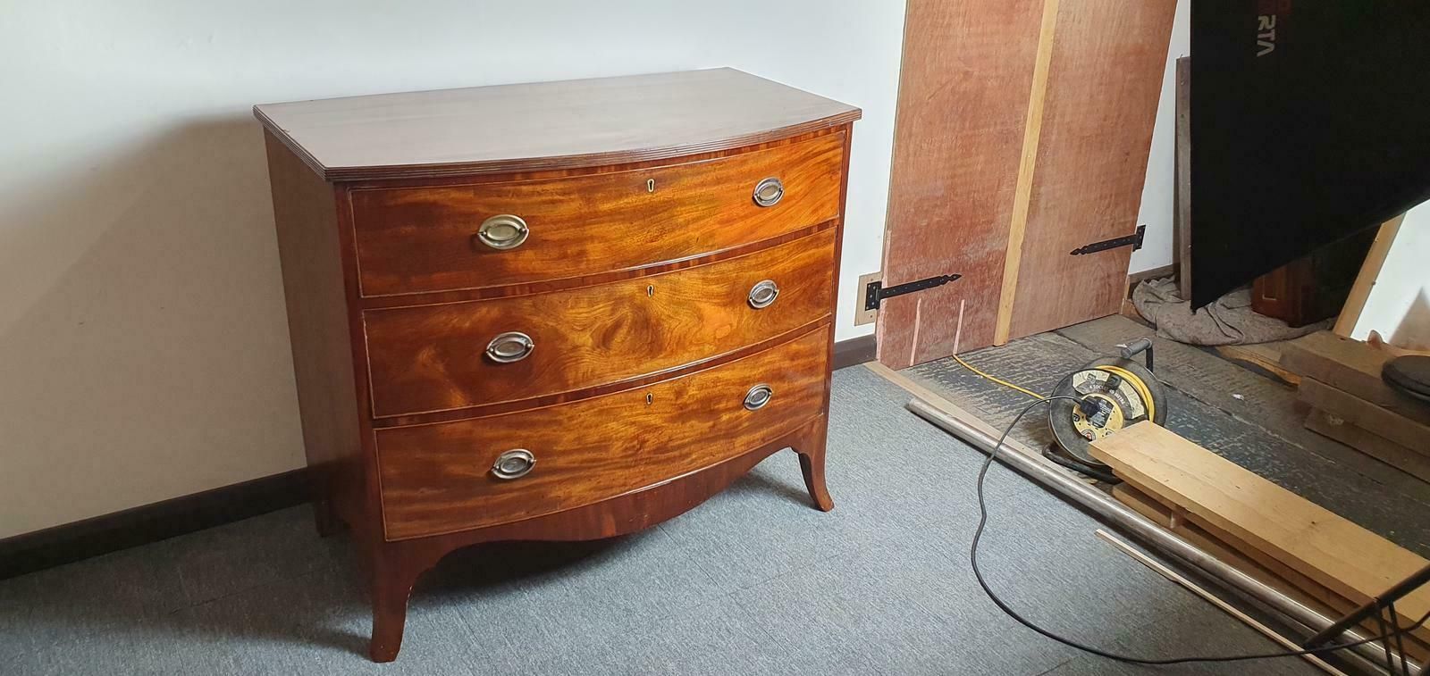 Georgian Mahogany Bow Front Chest Of Drawers On Splayed Feet photo for sale