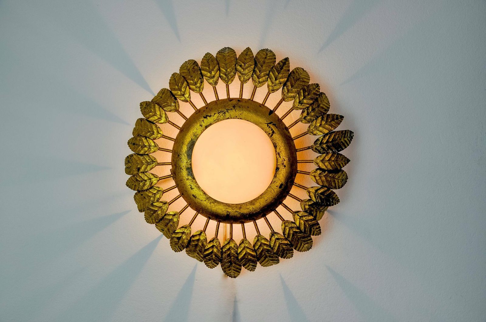 Sun Wall Lamp By Ferro Arte In Metal, Gold Leaf And Opaline Glass, Spain, 1960 photo furniture