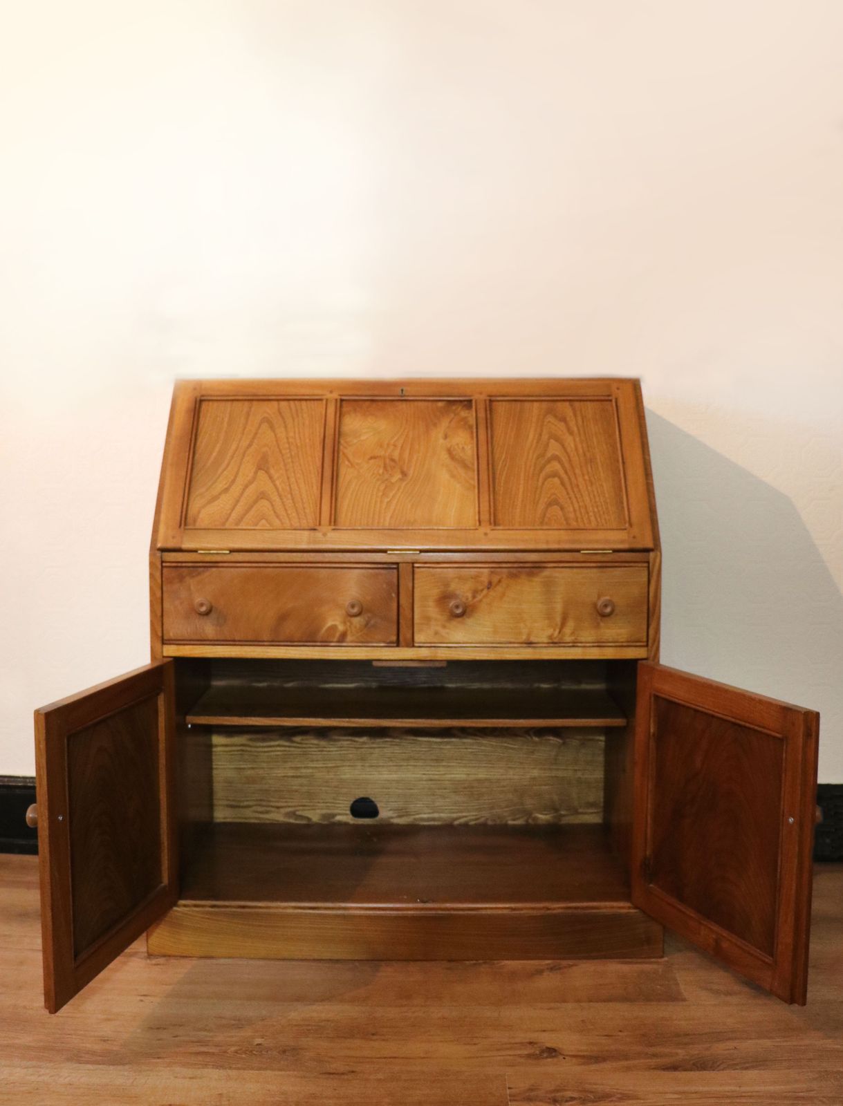 A Lovely Piece Of Ercol Elm Furniture From The Golden Dawn Range. photo for sale