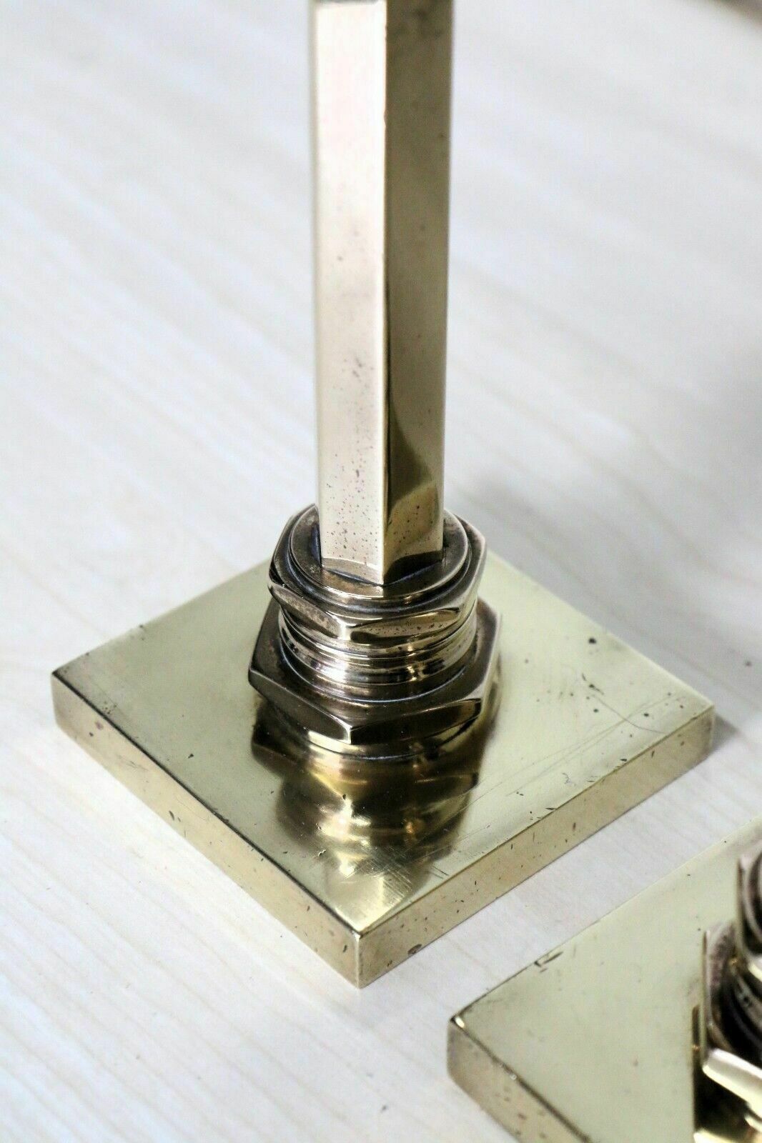 Candlesticks A Pair Of Art Deco Machine Age Brass Antique Candle Sticks photo vinterior