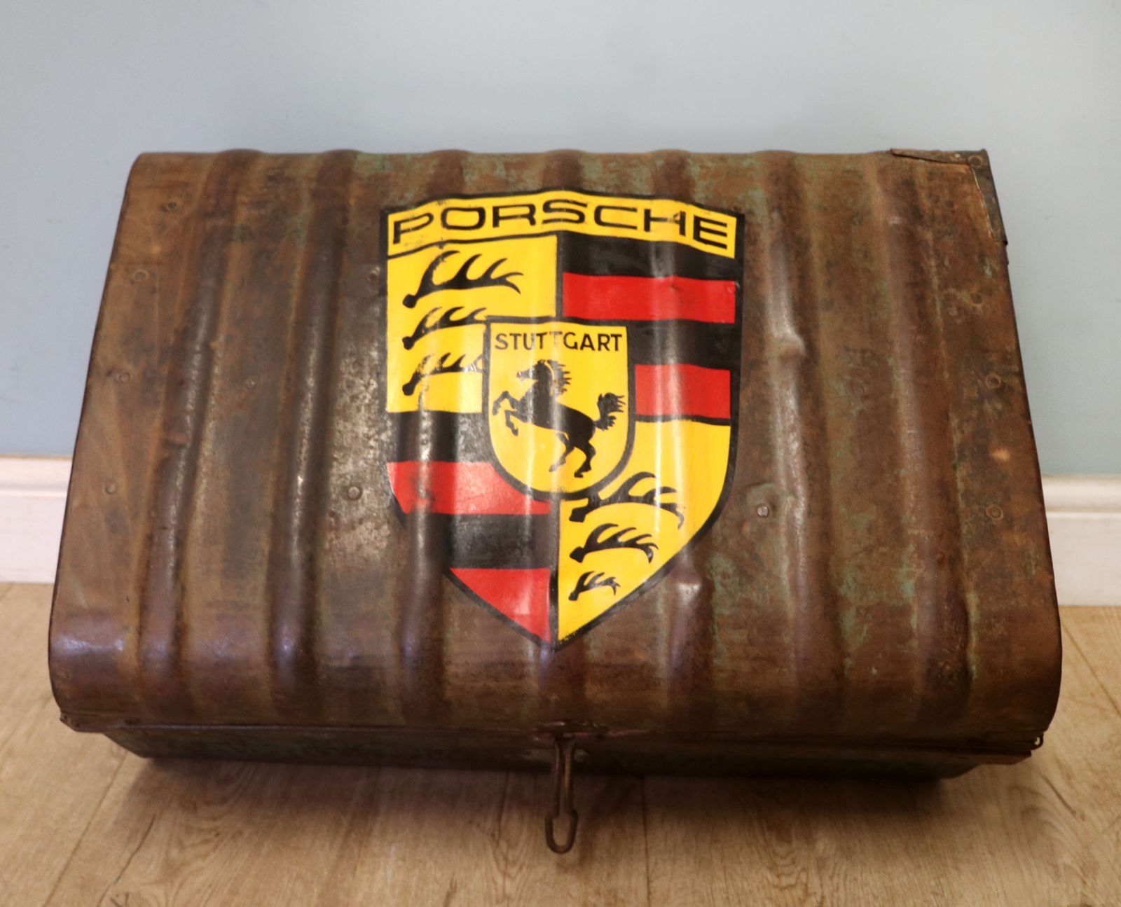 A Lovely Vintage Metal Trunk Which Has Been Later Hand Sign Written With The Porsche Emblem.