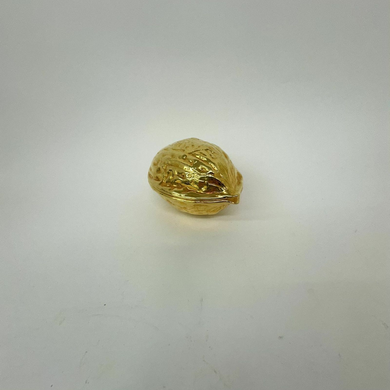 photo vinterior Vintage Gold Walnut Shaped Nut Cracker , 1970’s