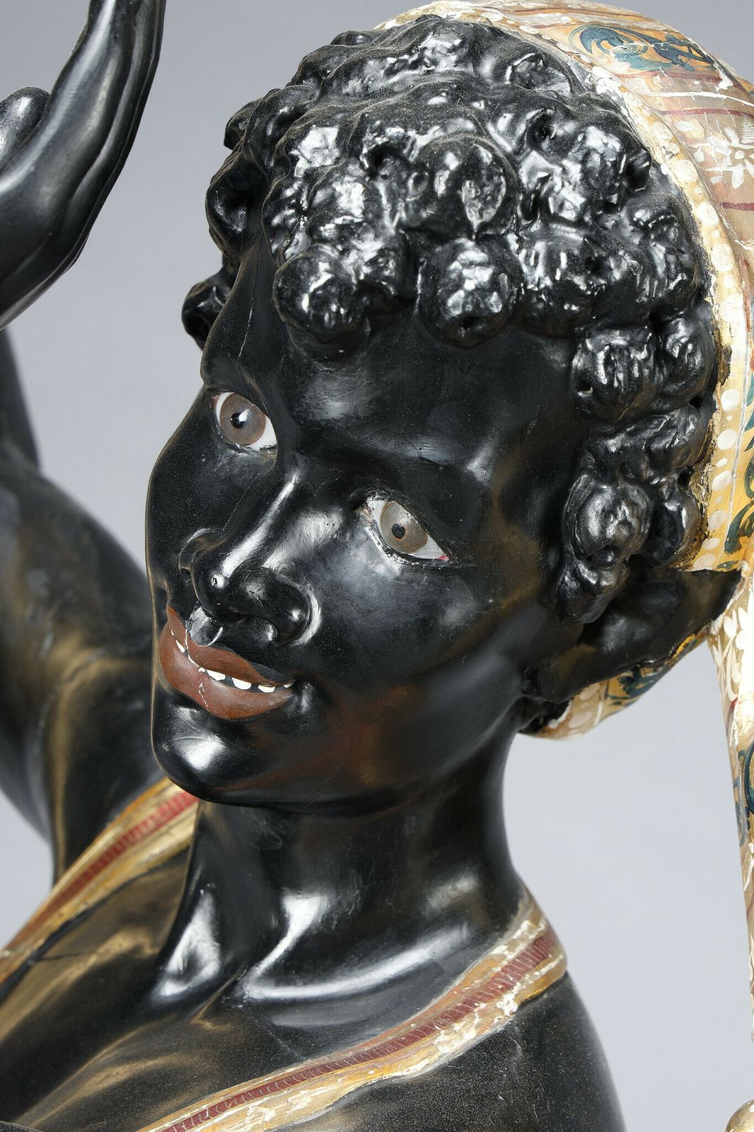 photo buy Pair Of Black And Polychrome Lacquered Wood Torchholders Depicting Nubians