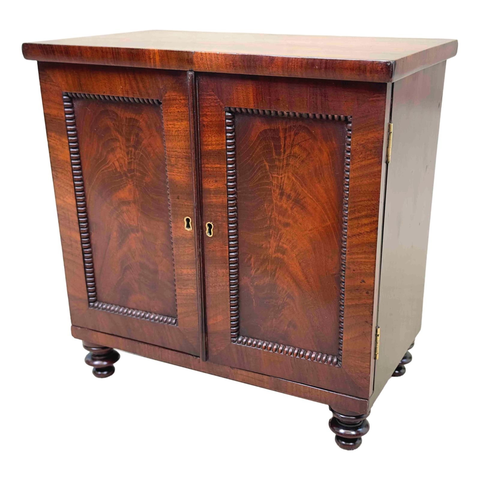 Regency Mahogany Miniature Cabinet (England, Circa 1820)