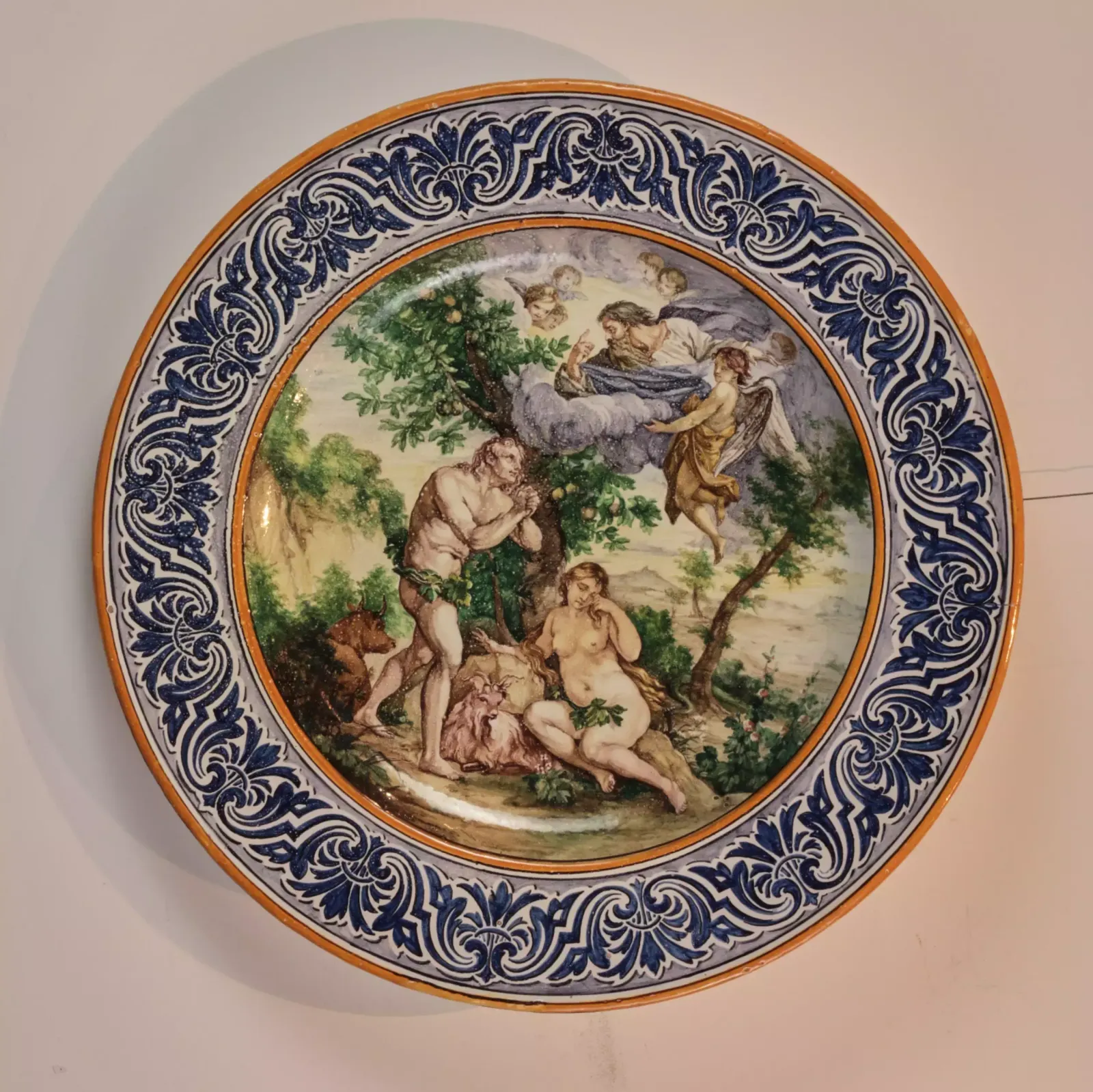 A Dish Of Italian Majolica "Expulsion From Paradise". photo for sale