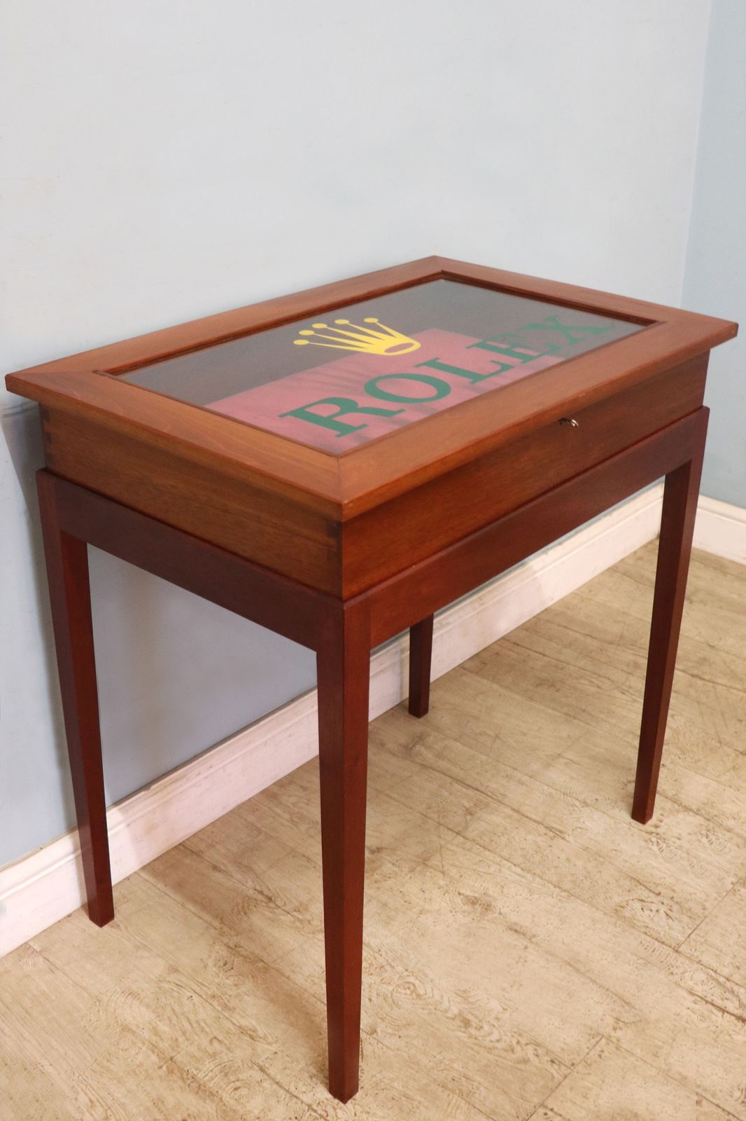 A Superb Bijouterie Display Table, Hand Sign Written With The Famous Rolex Watch Emblem. photo for sale