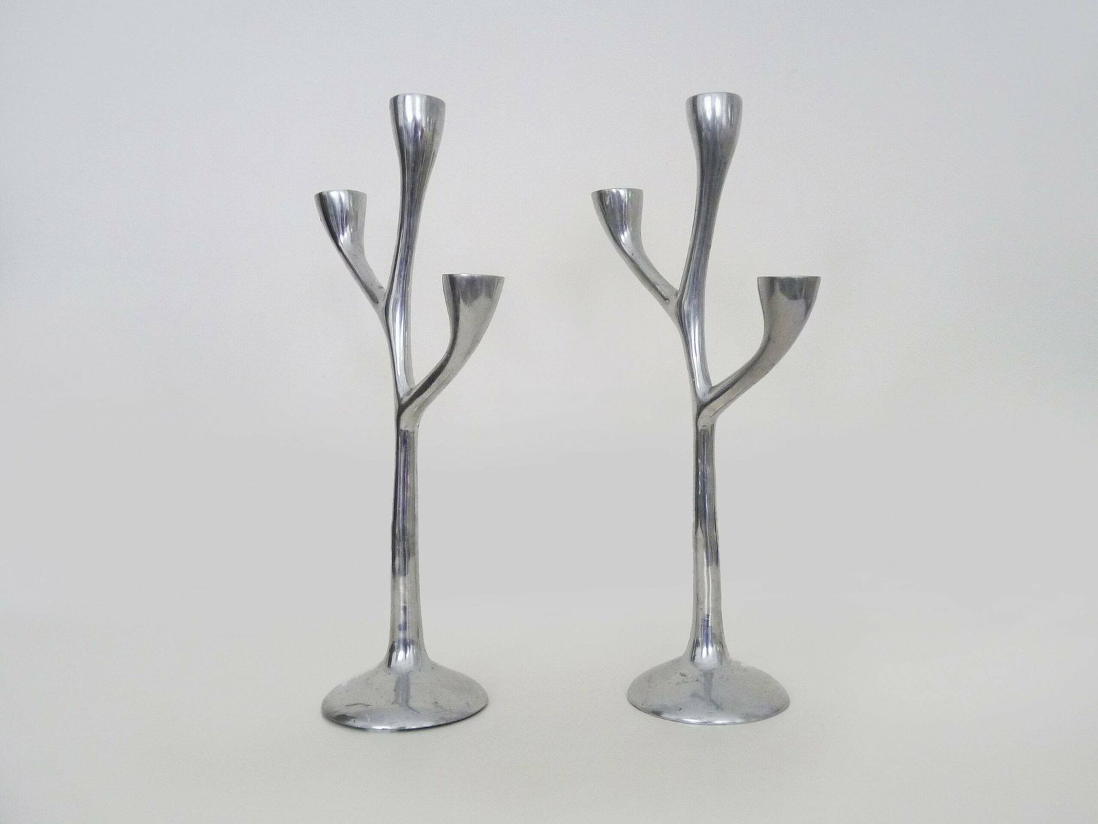 Pair Of Italian Tree Candlesticks In Cast Aluminum From The 80s photo for sale
