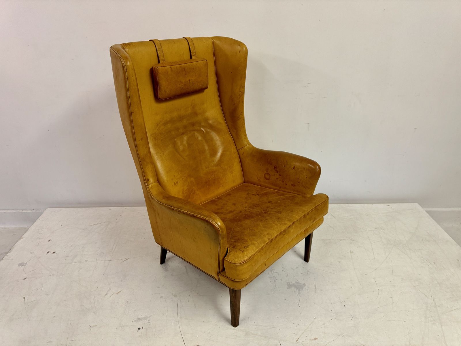 photo vinterior 1970s Patinated Leather Wingback Krister Armchair By Arne Norell
