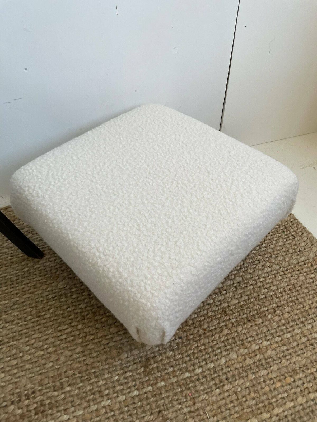 Chunky Low Lying Footstool With Tapered Legs And Cream Boucle Fabric photo furniture